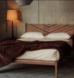 Take Home Your Ideal Bedroom with the Perfect Walnut Bed