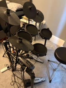 Alesis Nitro Mesh drum kit with stool and amp